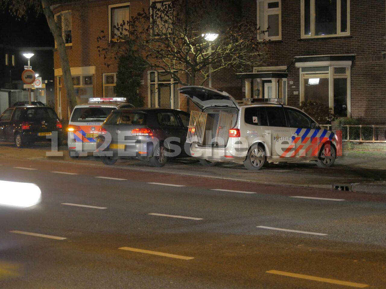 FOTO: Gewapende overval op kapper in Enschede; verdachte aangehouden